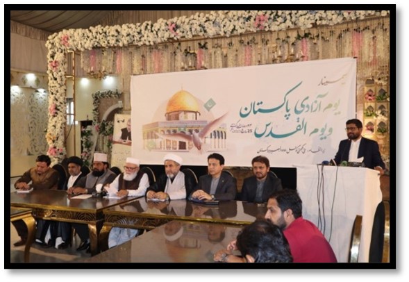 Conference with speakers and audience.